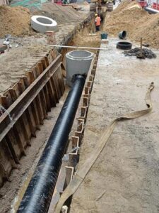 HDPE pipe installation site, underground water supply drainage pipeline laying, high density polyethylene pipe hot melt welding