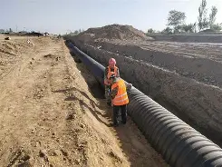 Trench foundation sand cushion laying for HDPE rainwater pipe construction